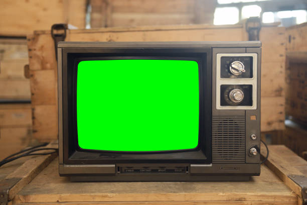 istock Old TV with green screen. Retro technology concept. 1729944883