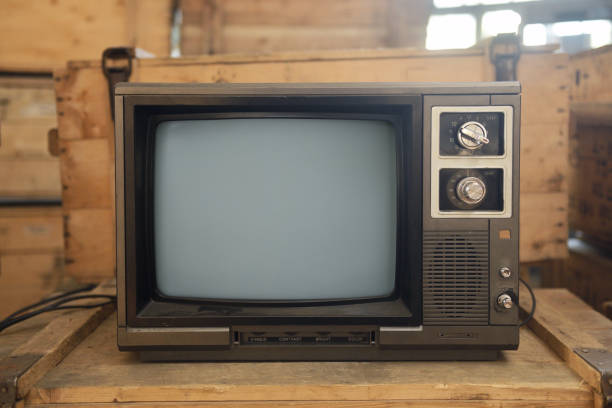 istock An old TV sits on a box. Retro technology concept. 1729944888