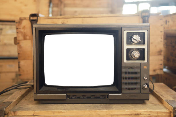 istock Old TV with a white screen on the bedside table. Retro technology concept. 1729947096