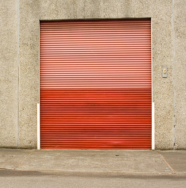 istock Red and Orange Steel Grate Door on Building 172995471