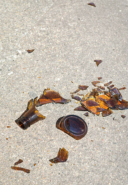 steli vetro su strada - close up of a broken bottle, street foto e immagini stock