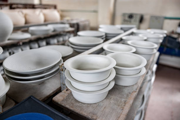 istock Ceramic pieces ready to be painted at a pottery factory 1729966318