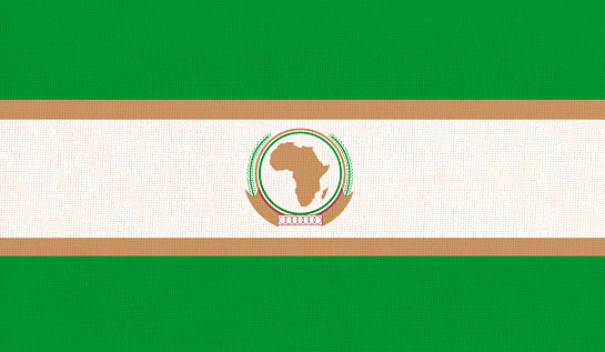 Flag of the African Union. flag of the Organization of African Unity. Flag of international organization. Fabric texture. political and economic union. AU