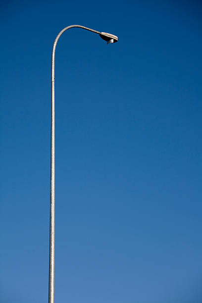 istock Very tall highway street light and copy space 172997446