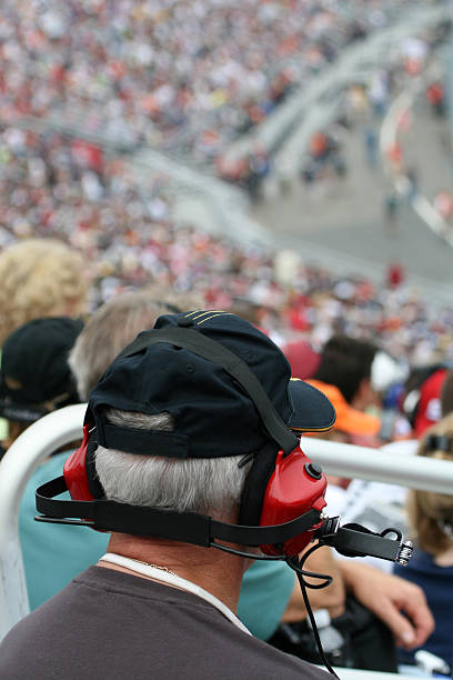 istock Senior Man With Earmuffs at Racing Event 172998643