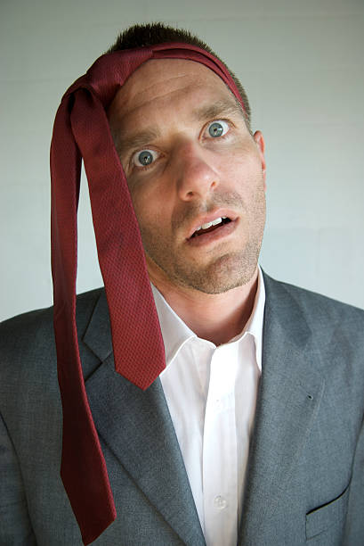 istock Businessman with Tie Around Head 172998824