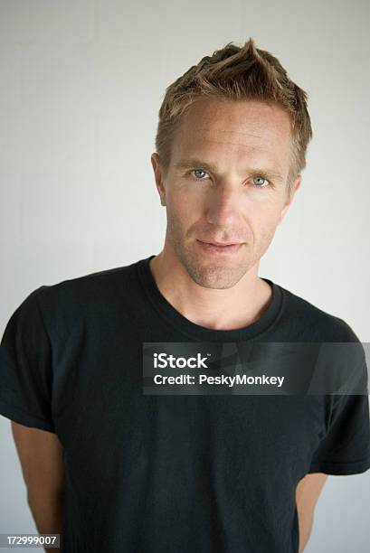 Portrait Of Young Man In Black Tshirt Spiky Hair Stock Photo - Download Image Now - Adult, Adults Only, Beautiful People