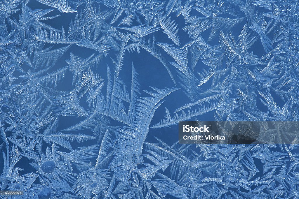 Frosty pattern Beautiful frost pattern on a window. Abstract Stock Photo