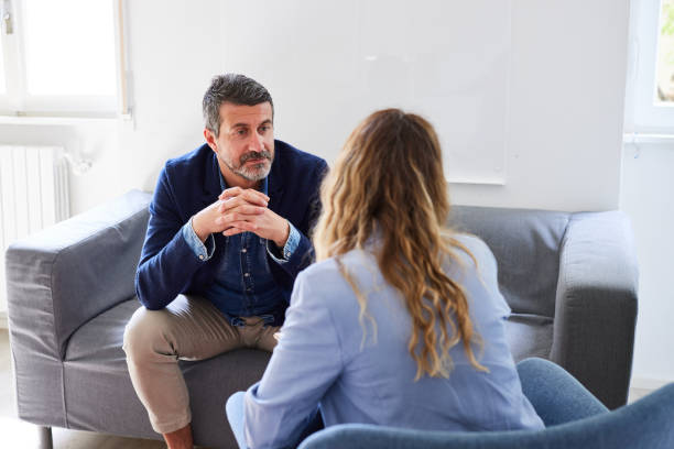istock Man listening to psychologist guiding to solve his marital issues 1729995766