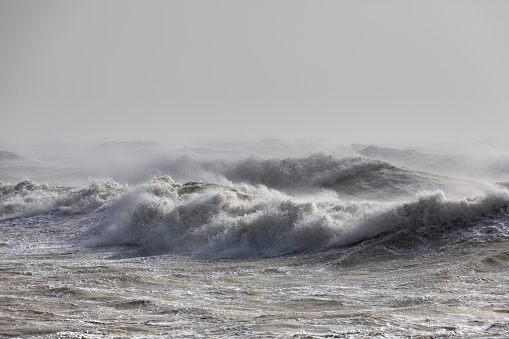 Peggy's Cove Lighthouse is inundated with surf associated with a violent Nor'Easter.