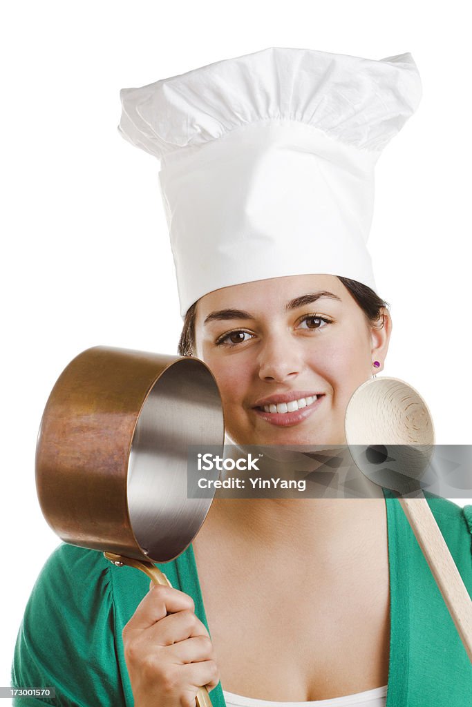 The Gourmet Isolated on White Subject: A young woman holding sauce pan and wooden spoon ready for cooking. Isolated on white background. 20-29 Years Stock Photo