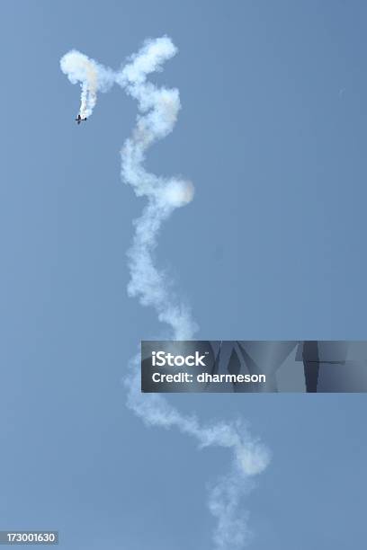 Stunt Pilot Stock Photo - Download Image Now - Airplane, Aerobatics, Blue