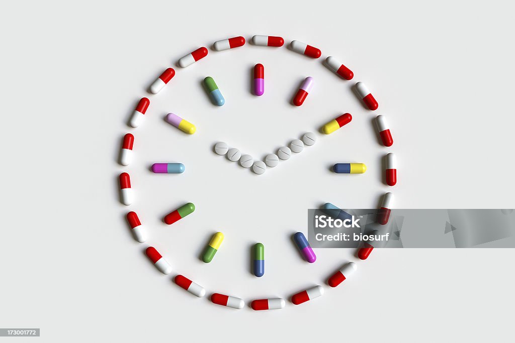Pillole di Clock - Foto stock royalty-free di Orologio