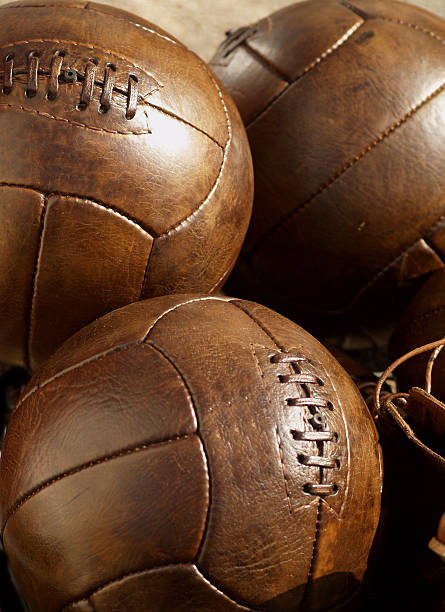 istock Old leather soccer balls 173002259
