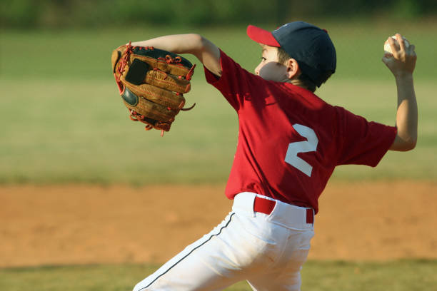 istock Child pitching for a baseball game 173002810