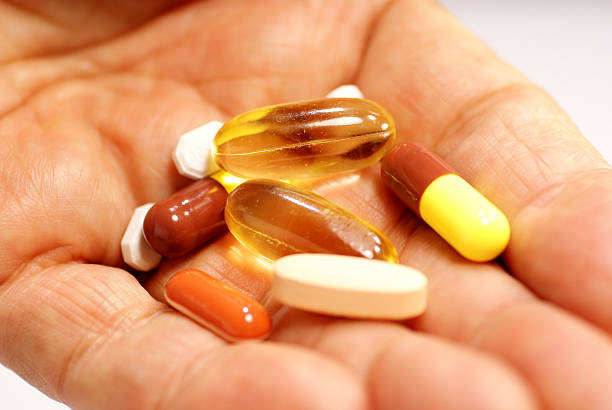 istock Senior Hand Displays Various Medicines 173002983
