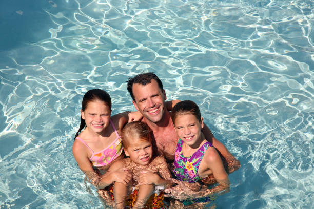 istock Family fun vacation in Swimming Pool 173003143