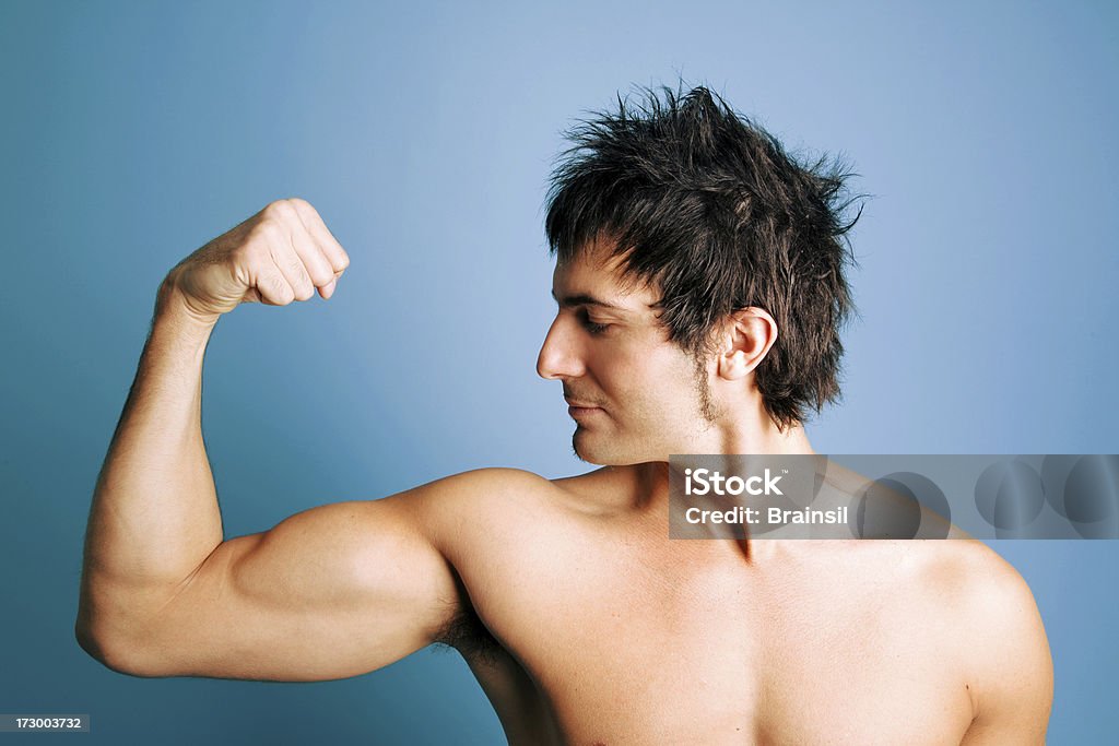 Homem mostrando sua Biceps - Royalty-free Adulto Foto de stock