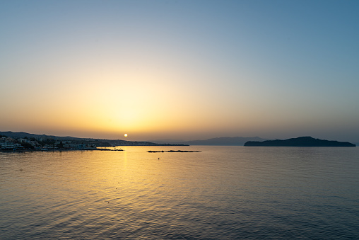 Calm sea in Crete during sunset