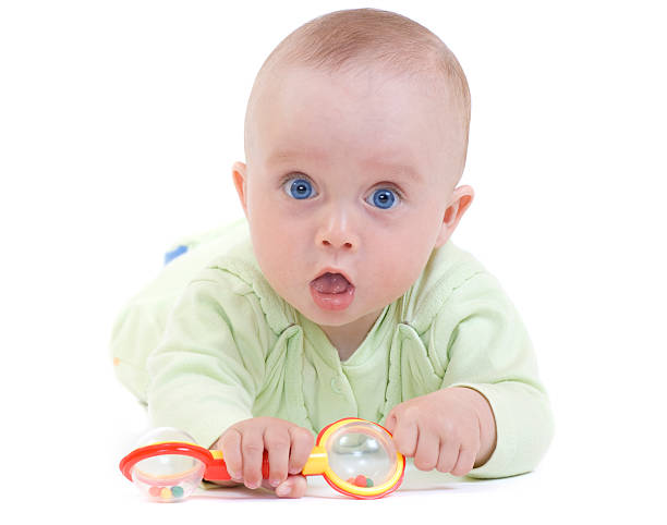 Baby playing stock photo