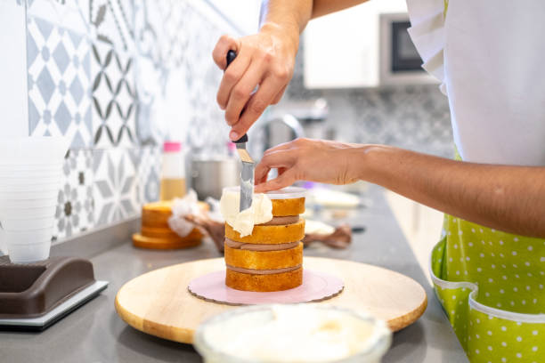 istock Expertise shaping a cake in a commercial kitchen 1730056922