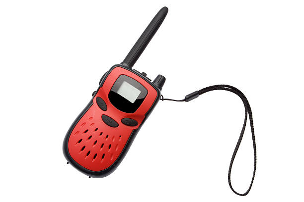 Red 2-way radio or walkie-talkie on white