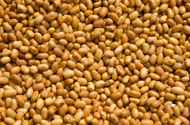 Beans for sale in bulk in outdoor market in Peru.