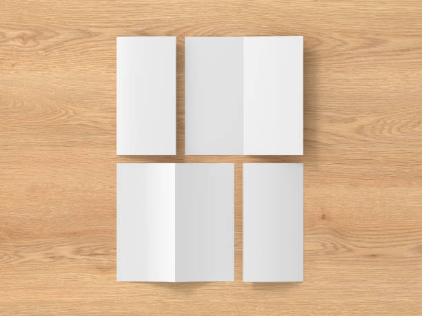 istock Half-folded flyer vertical booklet mockup on wooden background 1730073385