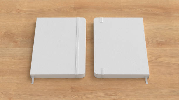 istock White cover notebook mockup on wooden background 1730078807