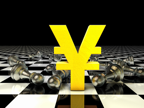 Yen symbol and chess pieces