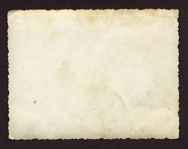 blank old textured paper on black background