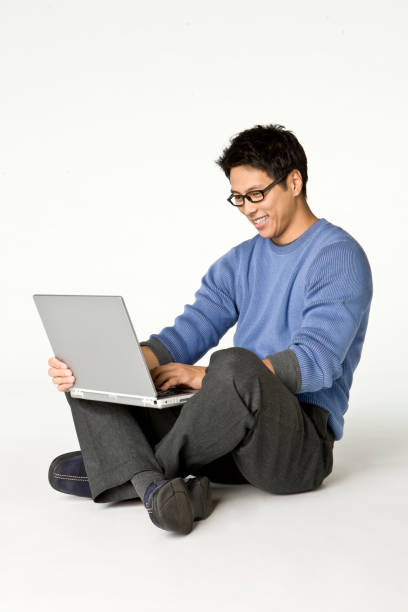 istock Asian Man Cross legged sitting on white seamless 173008578
