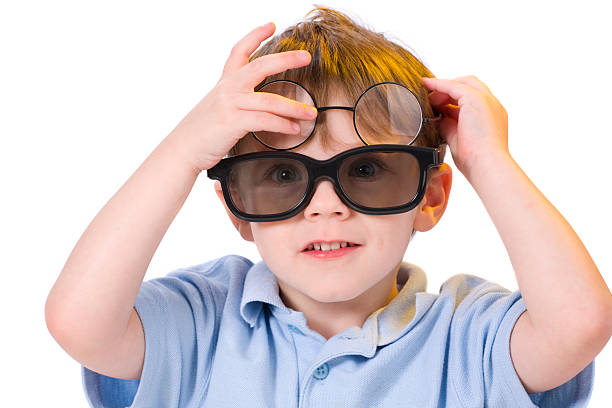 istock Little Boy Goofing around with Glasses 173009792