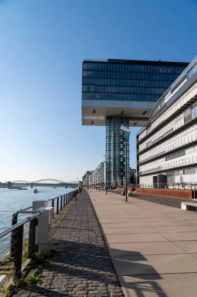 Photo of Cologne Kranhaus business center 
on the Rheinauhafen waterfront in sunny morning