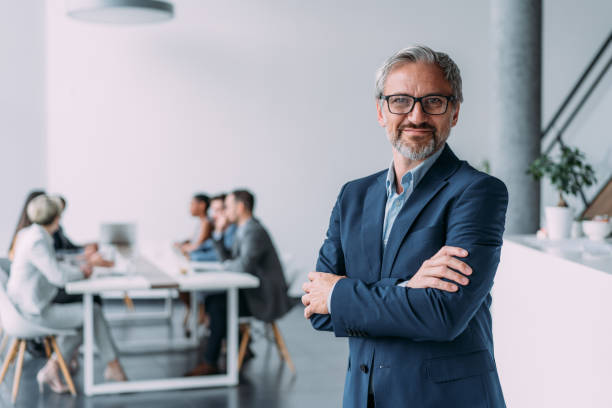 istock Confident businessman and his team. 1730119762