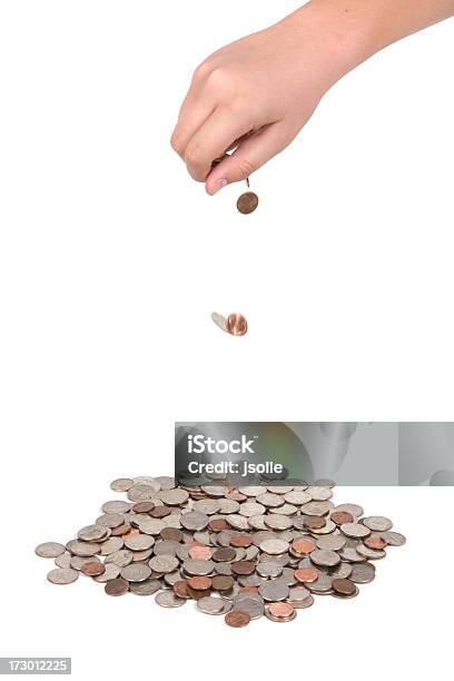 Hand Dropping Coins Stock Photo - Download Image Now - Banking, Bouncing, Business