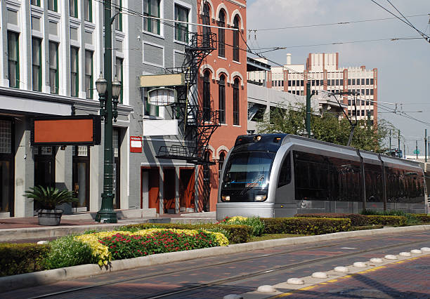 Houston Light Rail Traveling Past Businesses stock photo