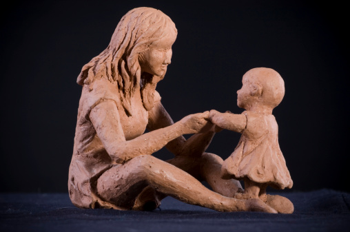 Two sculptures made out of clay.This object has a property release which is signed by the creator of the art object.More art: