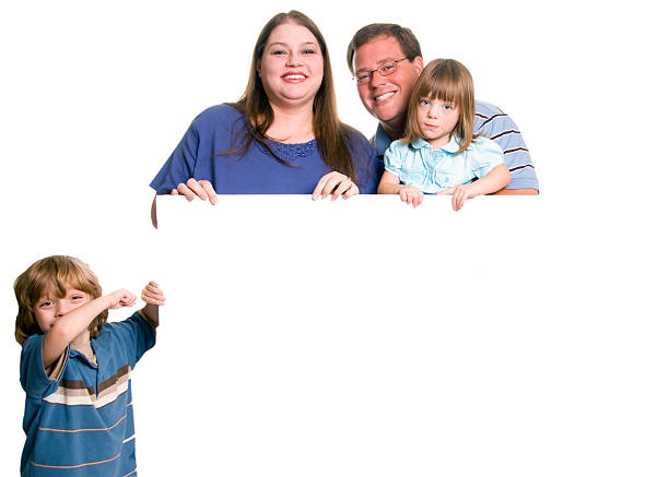 Happy family portrait smiling - isolated over a white background