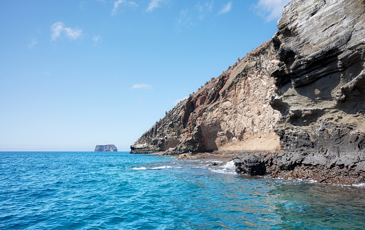 Galapagos Island cliff seen from the water, Ecuador.