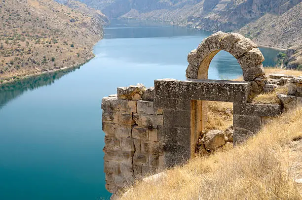 Old ruins of a castle from 12th century on the Firat River in Halfeti, Gaziantep, Turkey