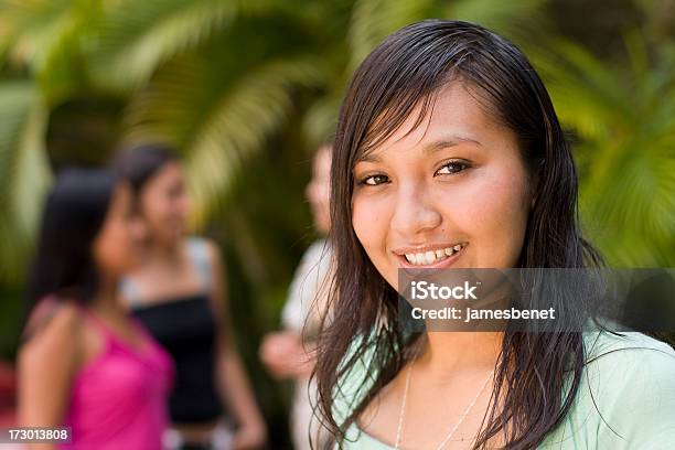 Hispanic Girl Smiling With Friends Stock Photo - Download Image Now - 16-17 Years, 18-19 Years, Adult