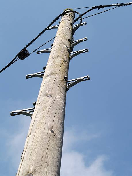 Poste de Telégrafo com pé dá - fotografia de stock