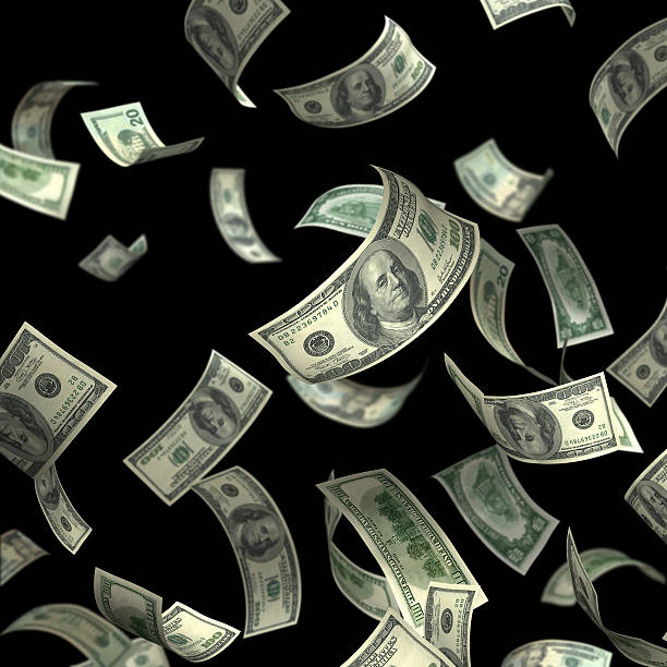 Isolated Money(XXL) Hundred dollar bills falling - Highly detailed money images on black background for easy cropping. pennies from heaven stock pictures, royalty-free photos & images