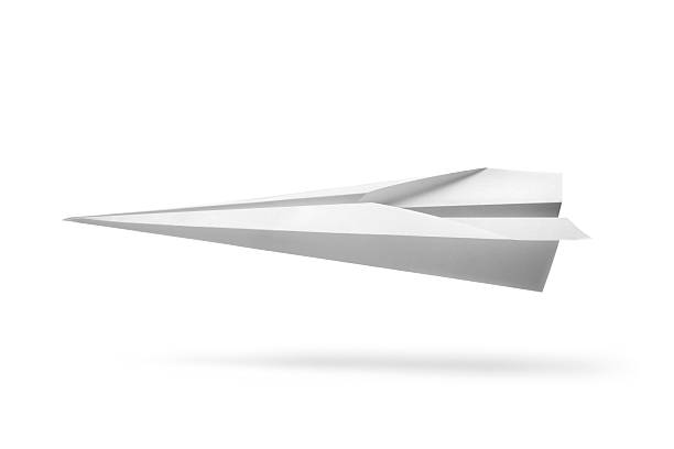 oficina: avión de papel - avión de papel fotografías e imágenes de stock