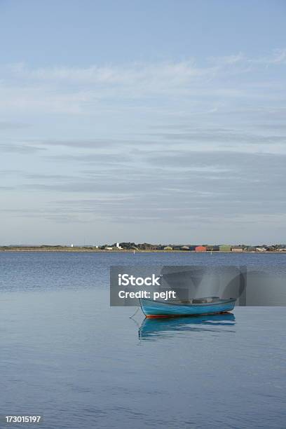Dinghy A Rowing Boat At Anchor In Limfjorden Stock Photo - Download Image Now - Anchored, Denmark, Fjord
