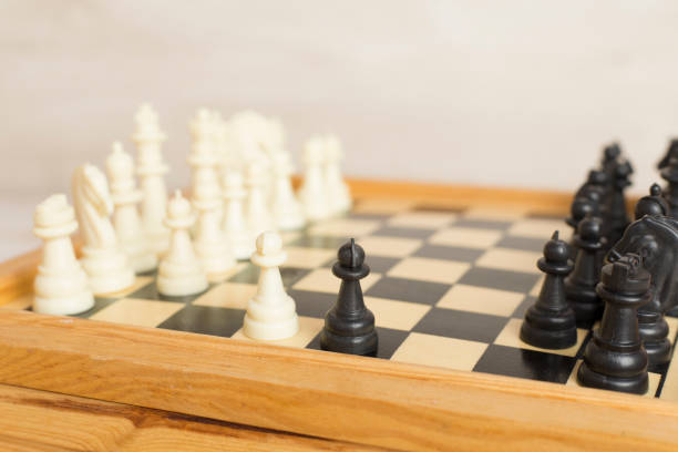 istock Wooden chess on concrete table 1730152238