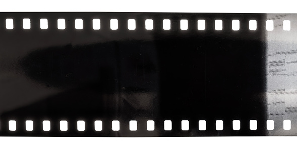 Helsinki / Finland - FEBRUARY 27, 2022: A vintage metallic film cartridge from the sixties against bright background.