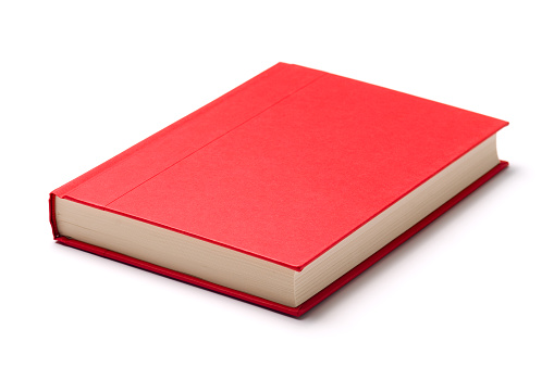 A single red book on a white surface
