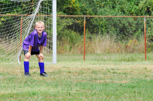 istock Young Male Athlete on Soccer Field 173016106